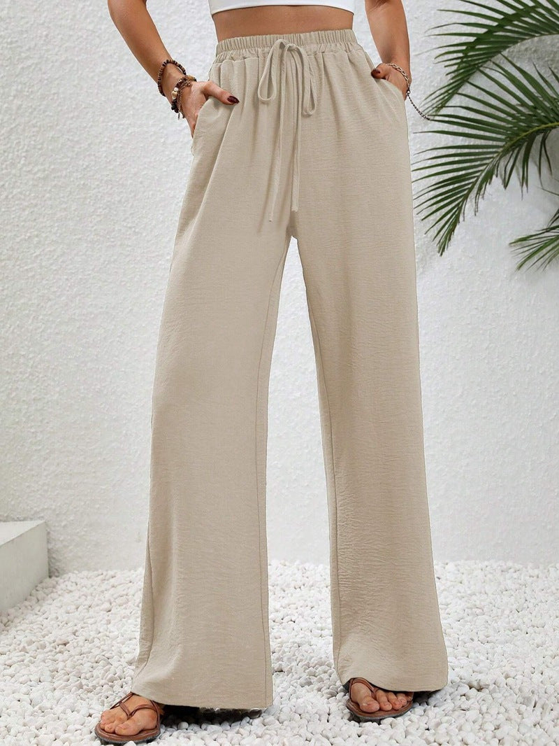 Women's casual, wide-legged leisure trousers with elasticated waistband and side pockets, size S