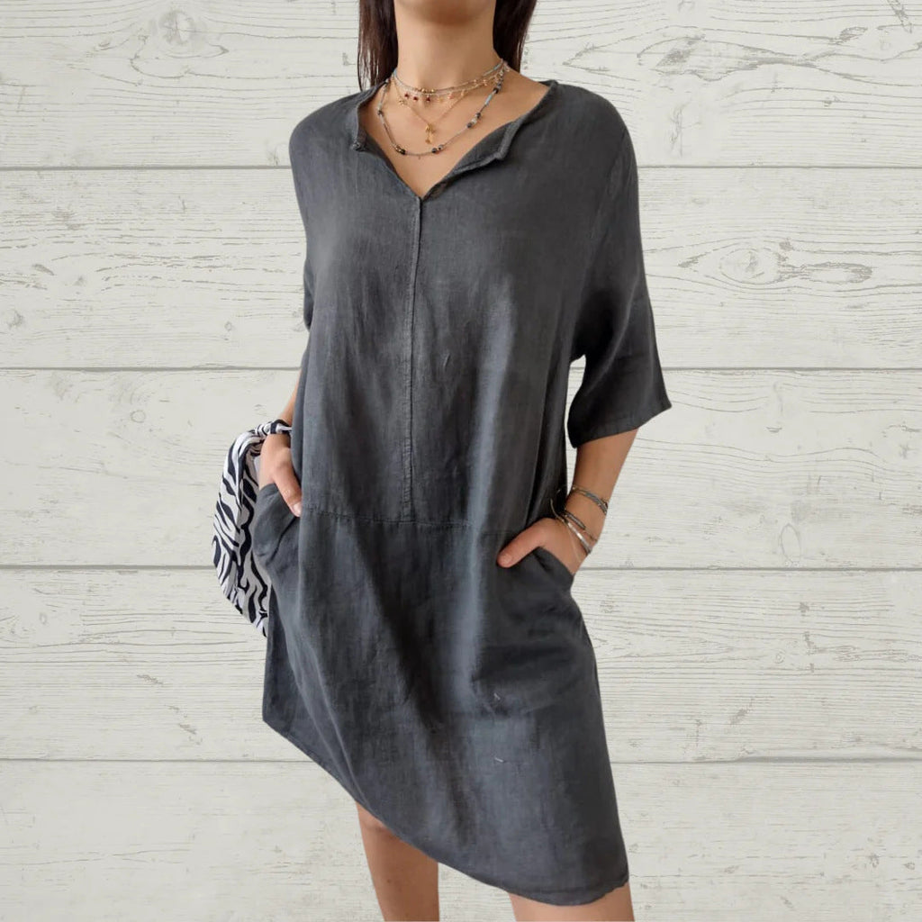 Women's lightweight linen dress with front button detail and side pockets, size