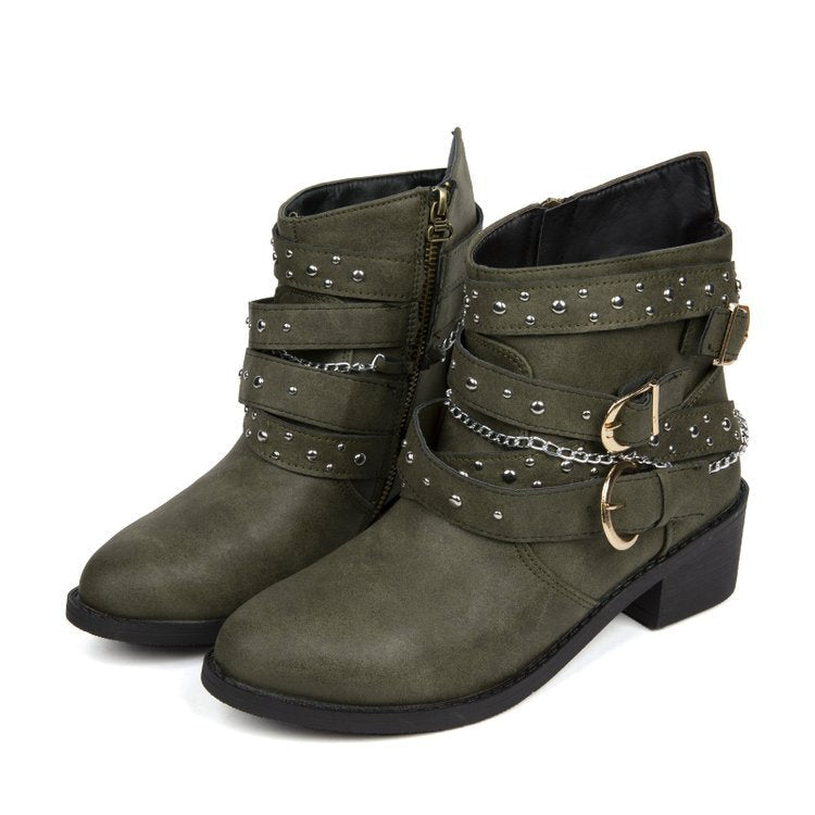 Women's ankle boots with a fashionable strap design and decorative accents, size S
