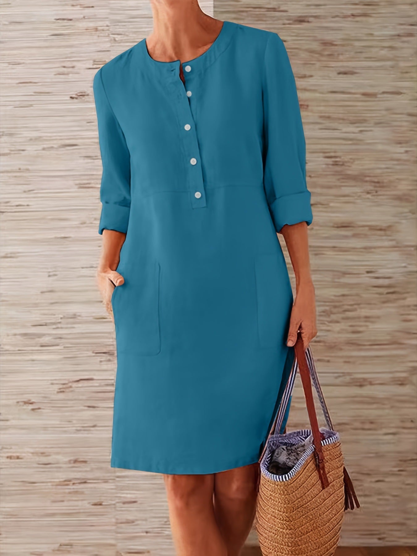 Women's versatile dress with button placket and practical pockets, size