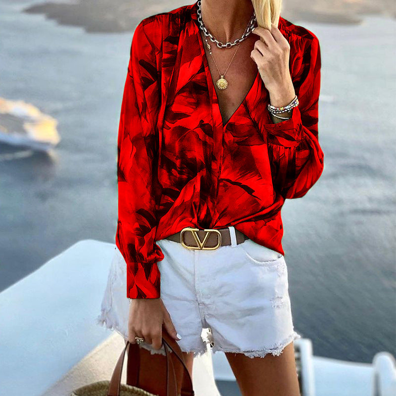 Women's blouse with floral pattern and elegant cut, size