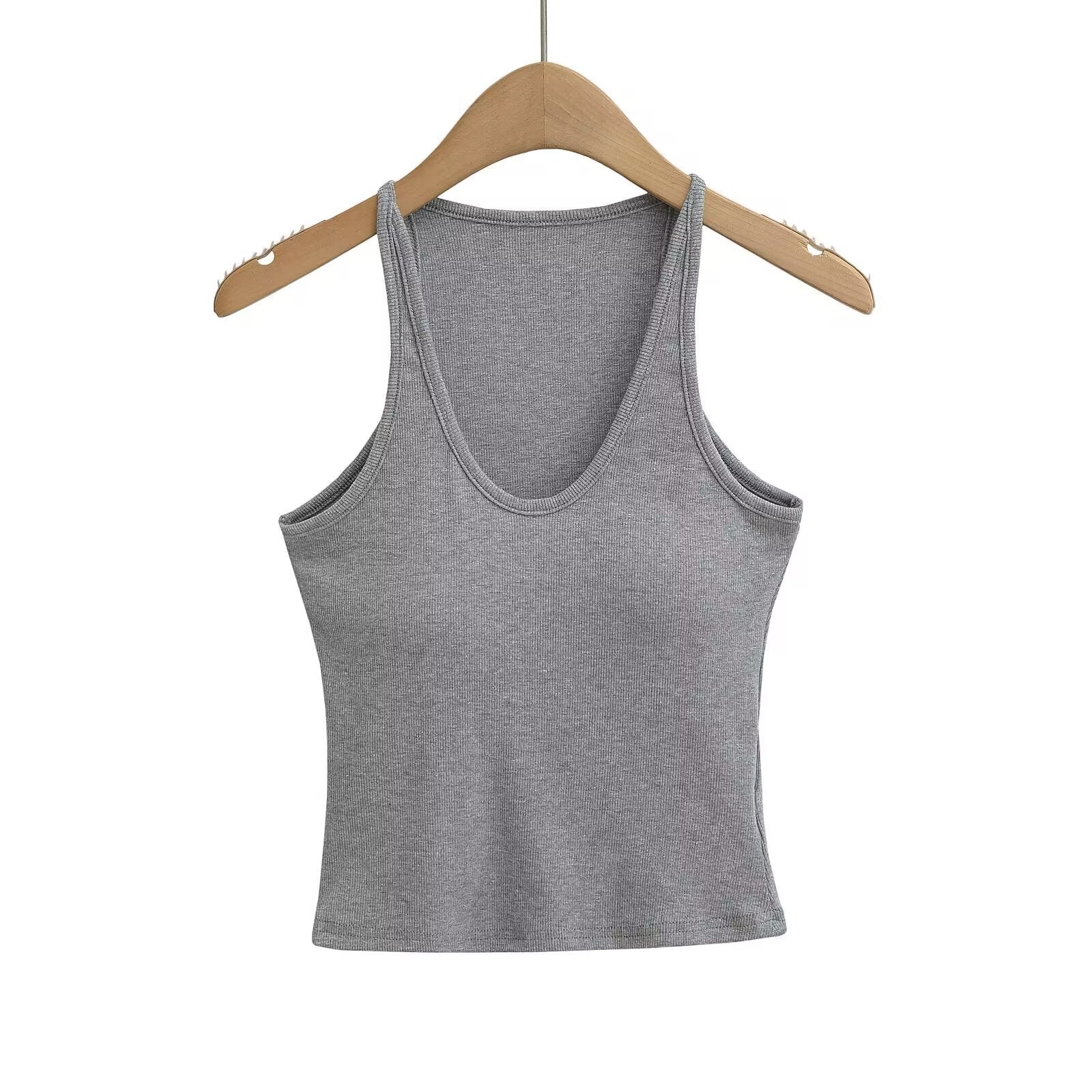 Women's sleeveless sports top with deep U-neck and elastic material, size S