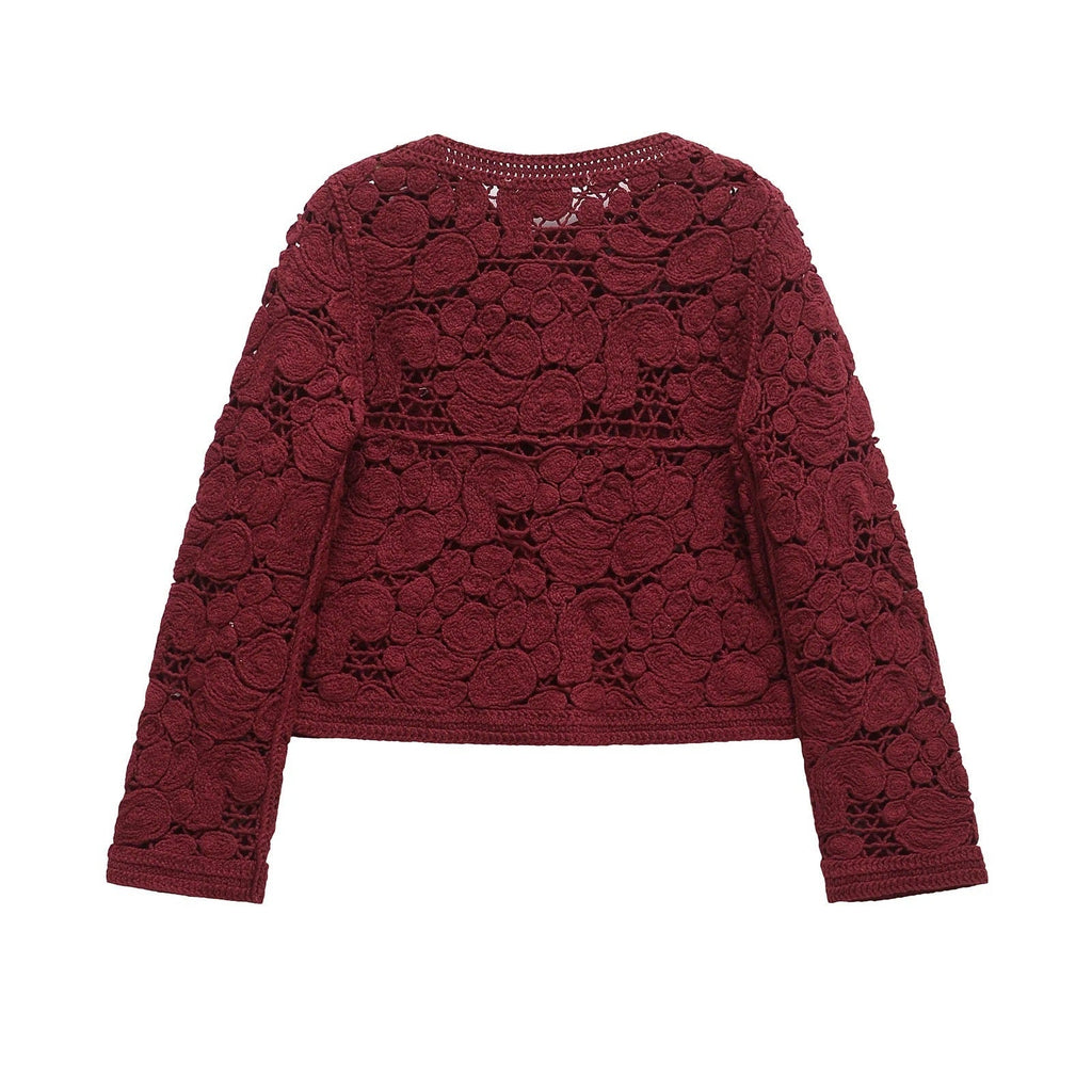 Women's cardigan made of fine lace with decorative button details and an elegant silhouette, size S