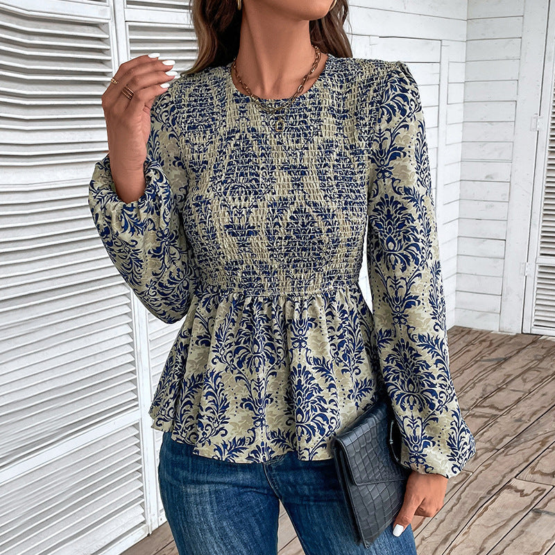 Women's blouse with elegant ruffle seams and floral pattern, size S