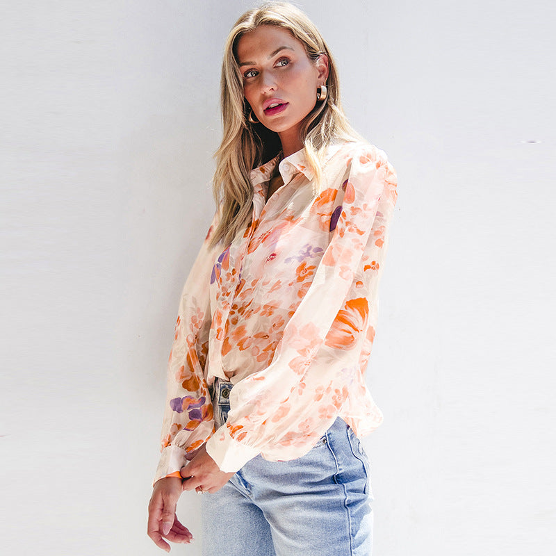 Luftige Damen-Blusenshirt mit Blumenmuster und voluminösen Ärmeln, Größe S