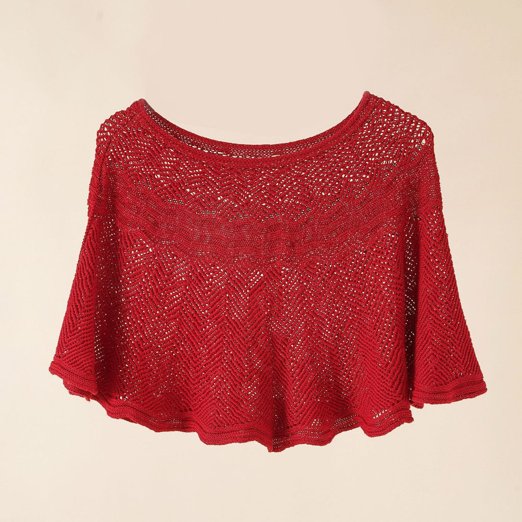 Women's airy knitted poncho in a modern design, size