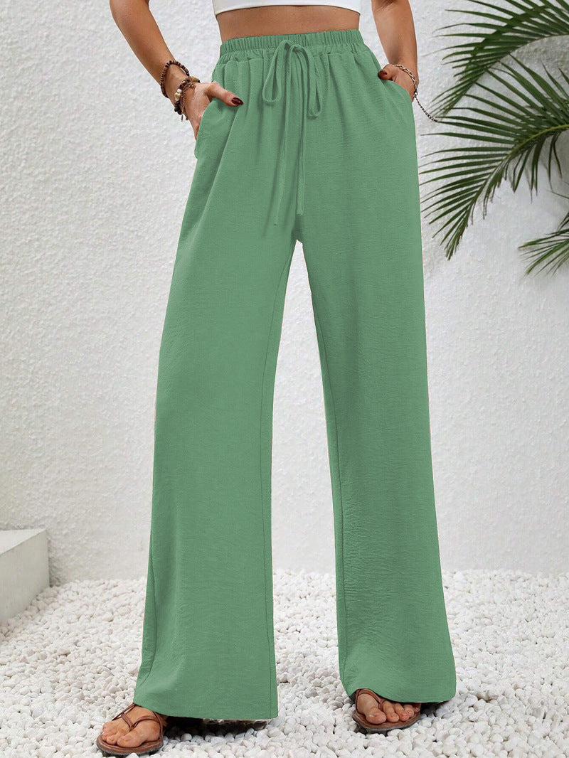 Women's casual, wide-legged leisure trousers with elasticated waistband and side pockets, size S