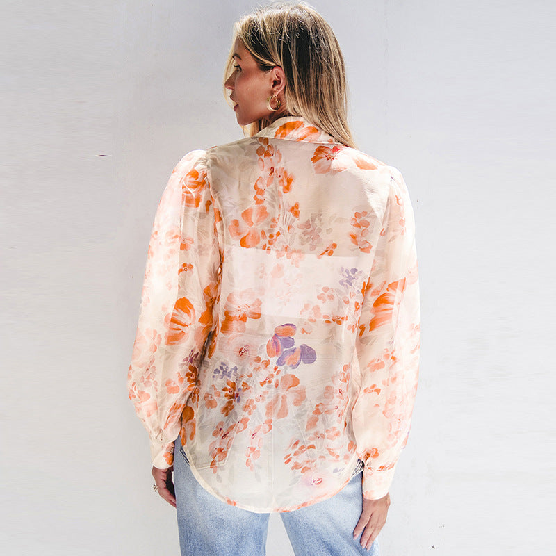 Luftige Damen-Blusenshirt mit Blumenmuster und voluminösen Ärmeln, Größe S