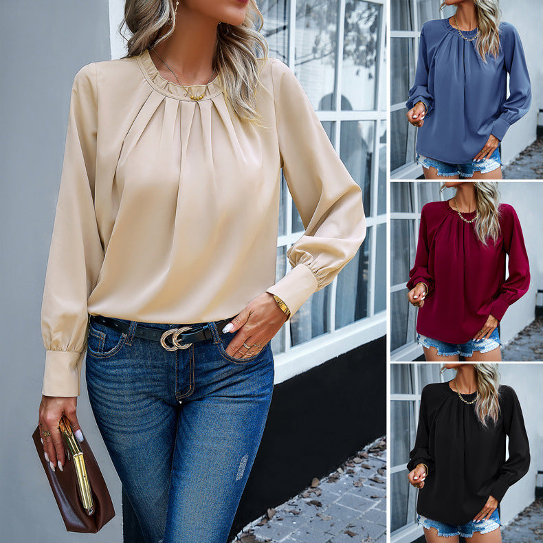 Women's blouse with elegant pleats and decorative round neckline, size