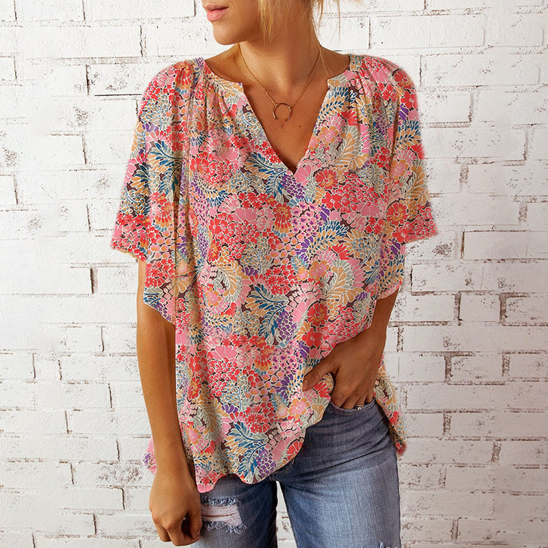 Women's blouse with floral design and relaxed fit, size