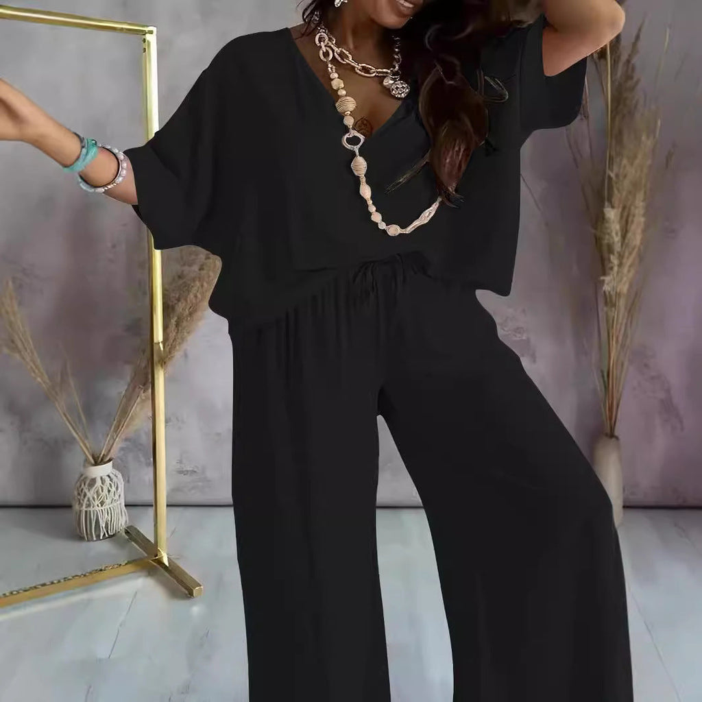 Women's elegant jumpsuit with V-neck and wide leg, size