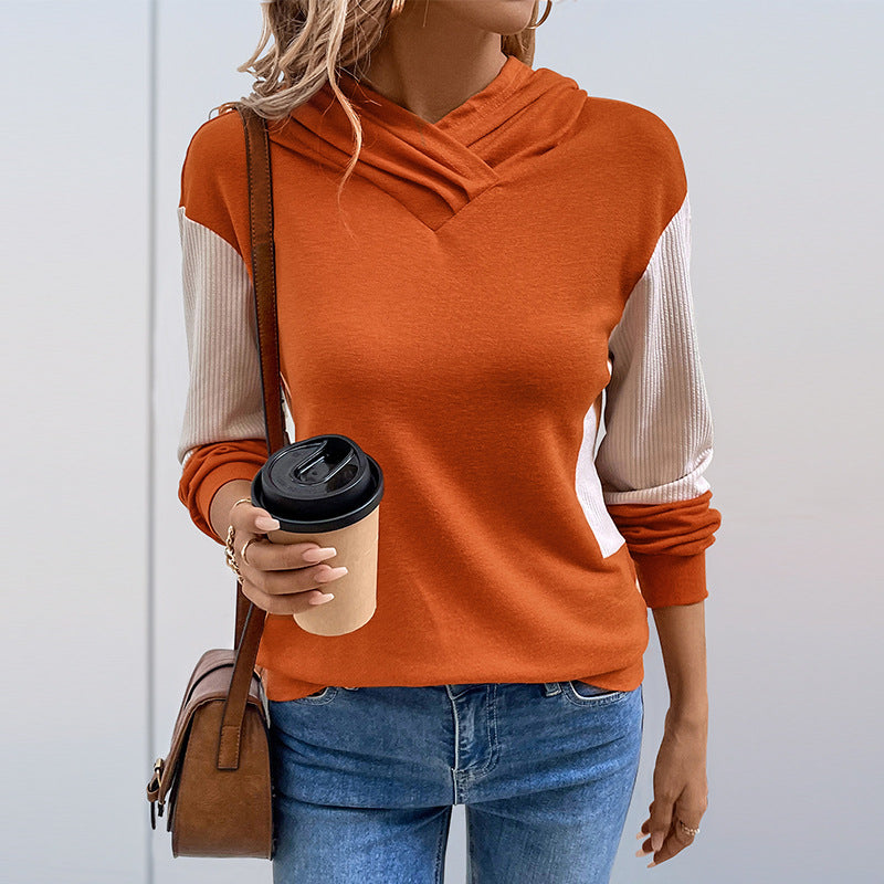 Women's hoodie with a modern V-neck and structured sleeve design, size S