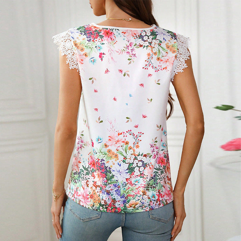Damenbluse mit Blumenmuster und eleganten Spitzenärmeln, Größe