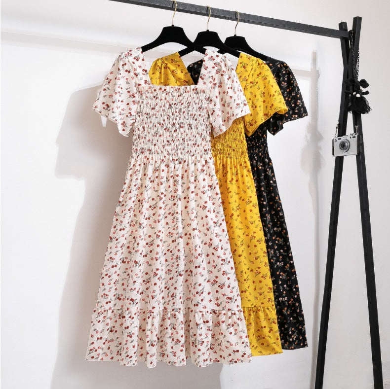 Women's floral print midi dress with elasticated waist and voluminous skirt, size [size]