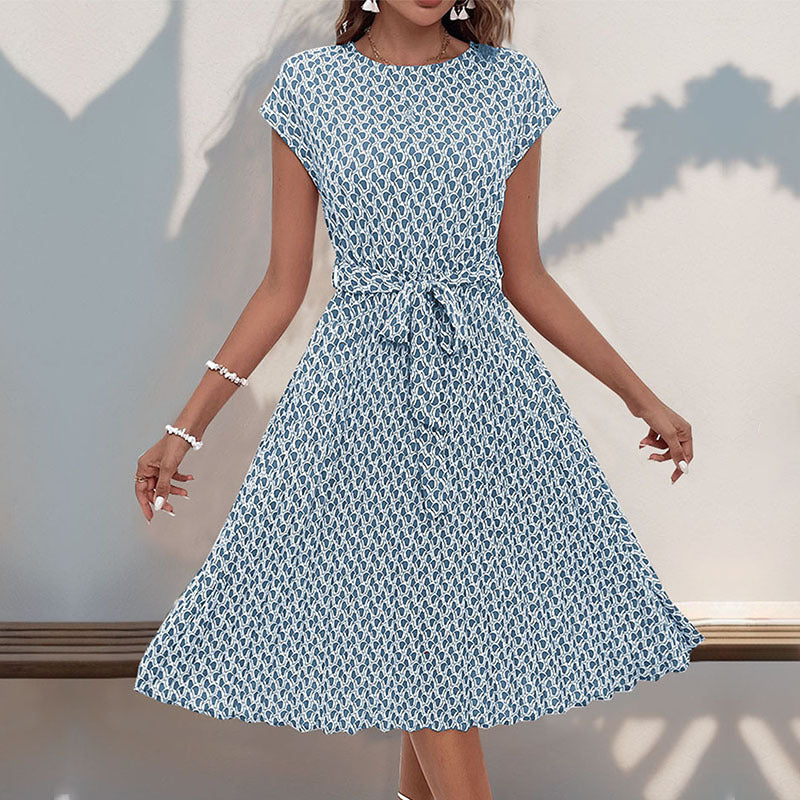 Women's midi dress with a sophisticated waist belt and playful pattern, size