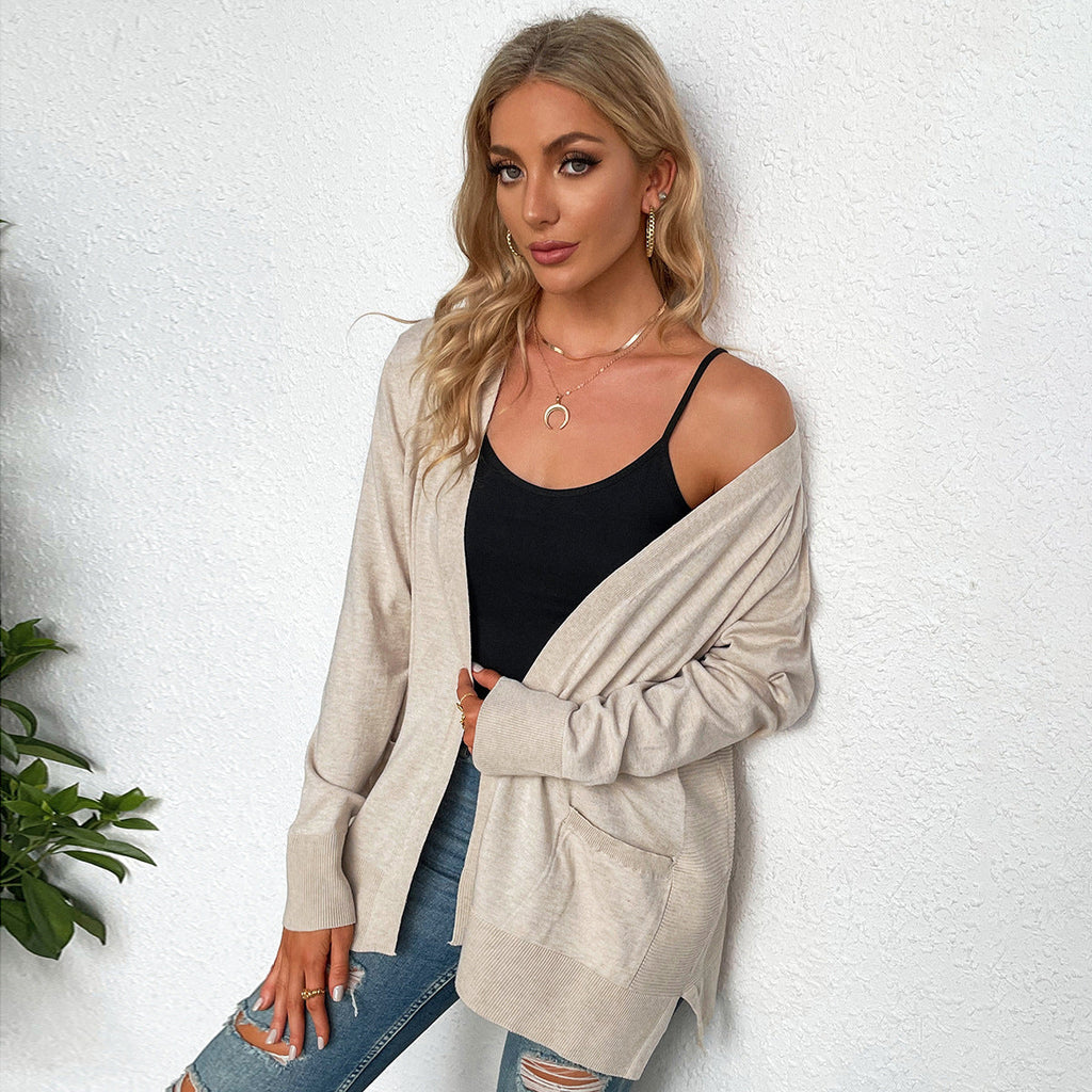 Women's casual knit cardigan with deep V-neck and practical pockets, size S