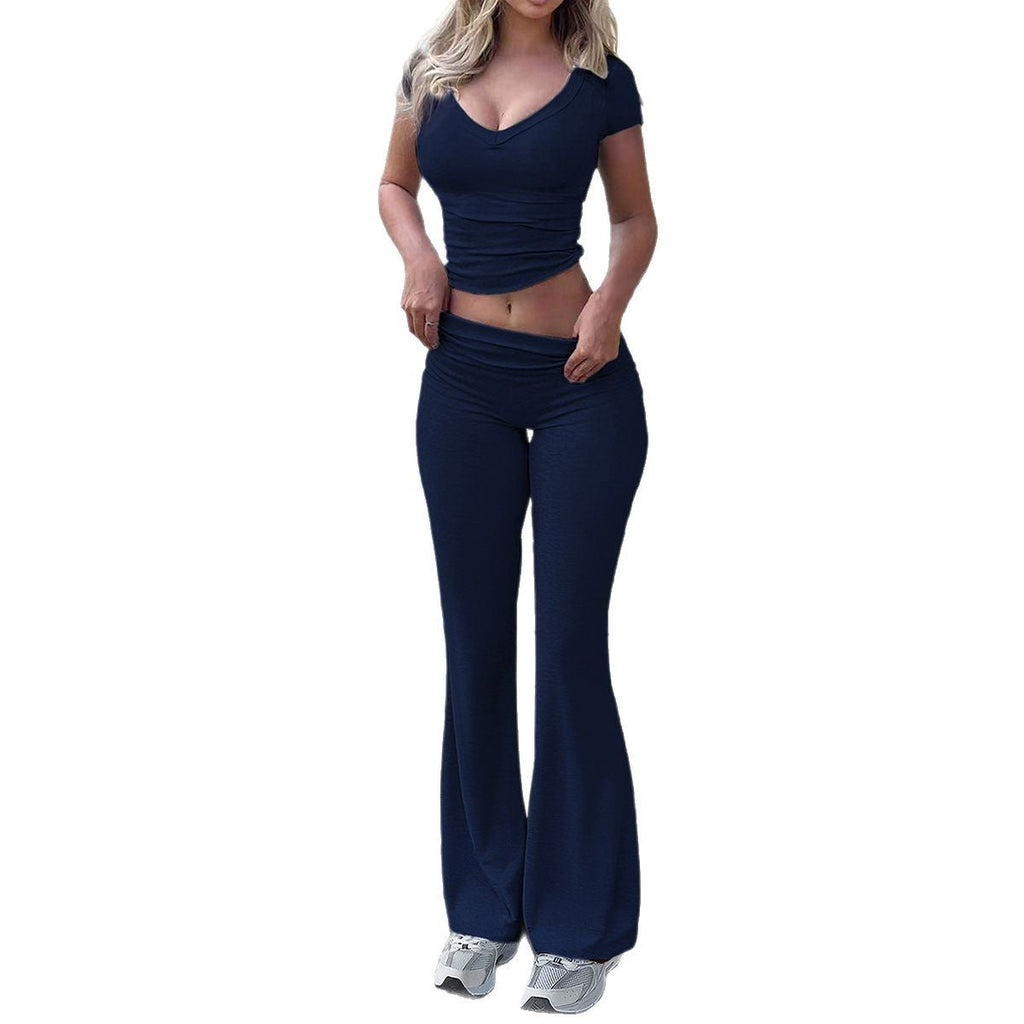 Women's sports lounge set with figure-hugging top and elegant flared trousers, size [size]