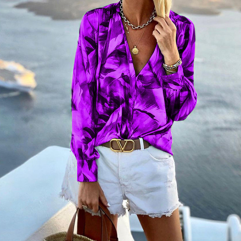Women's blouse with floral pattern and elegant cut, size