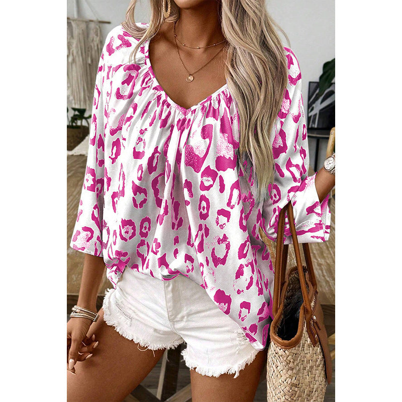 Women's blouse top with a relaxed fit and chic leopard print, size S