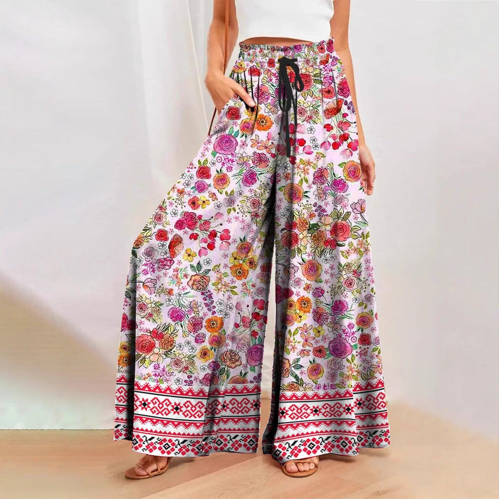 Women's wide-leg floral trousers with elasticated waistband and practical pockets, size
