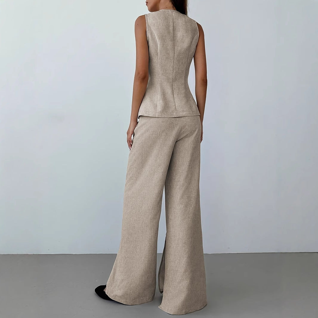 Elegantes Damen-Ensemble bestehend aus einem ärmellosen Blazer und einer weit geschnittenen Hose, Größe S