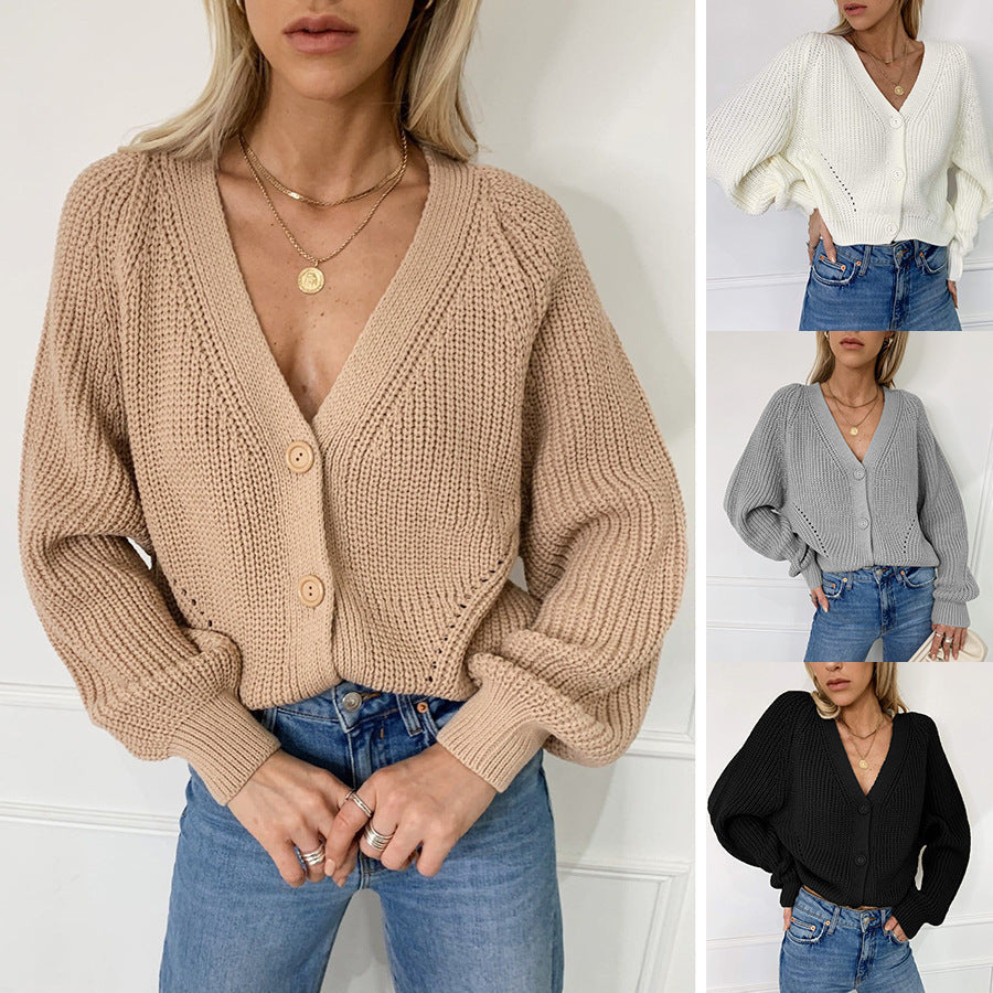 Women's oversized cardigan with button details, size