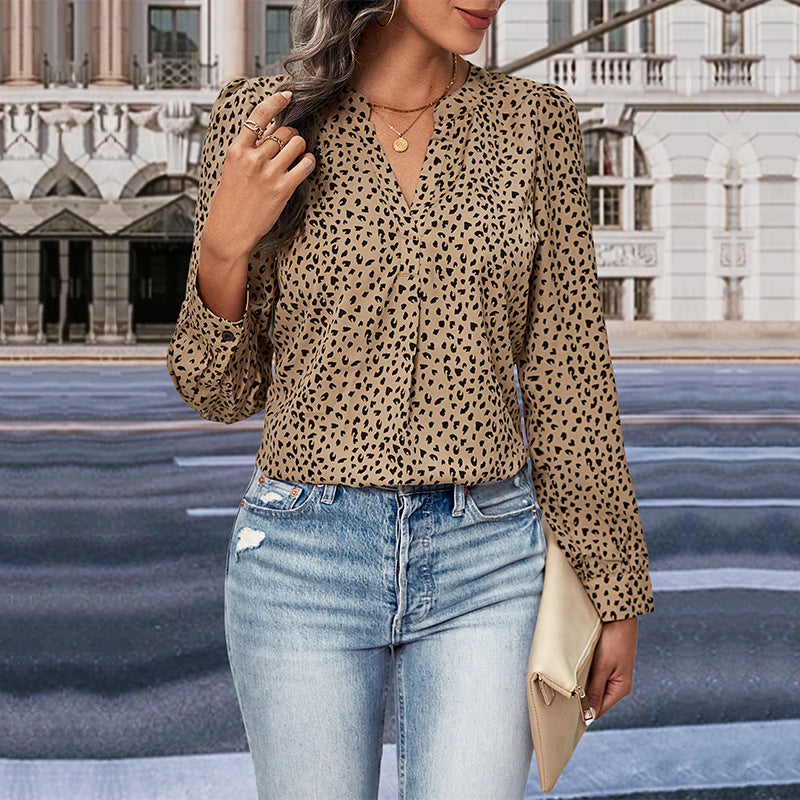 Women's blouse with modern polka dot design and elegant ruffles, size [size missing]