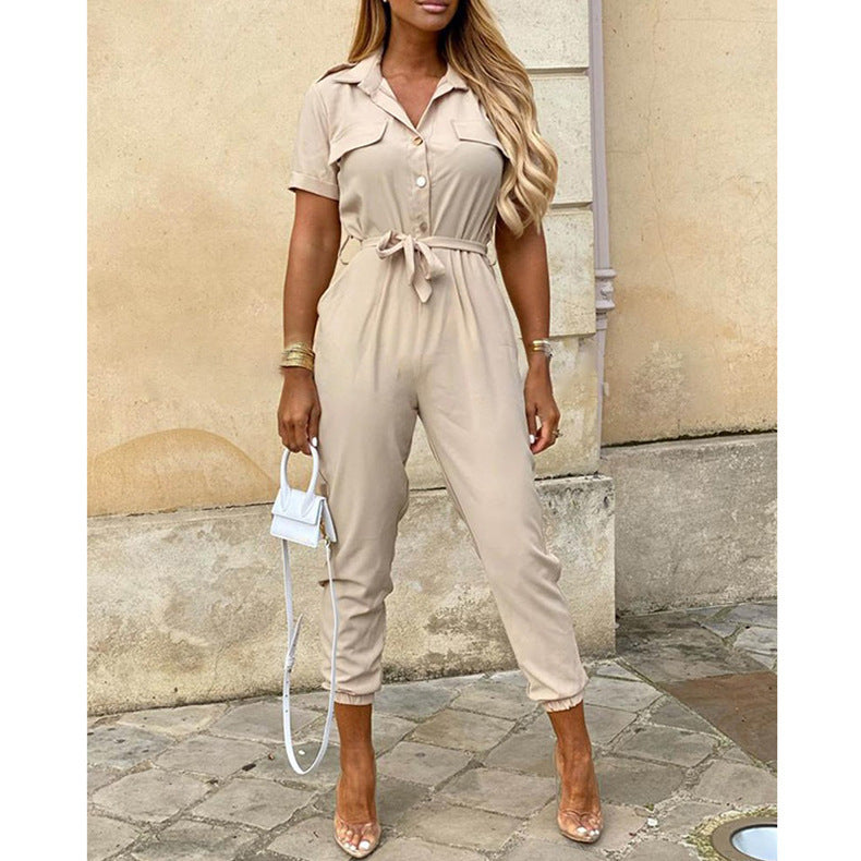 Women's figure-hugging short jumpsuit with button placket and adjustable belt, size S