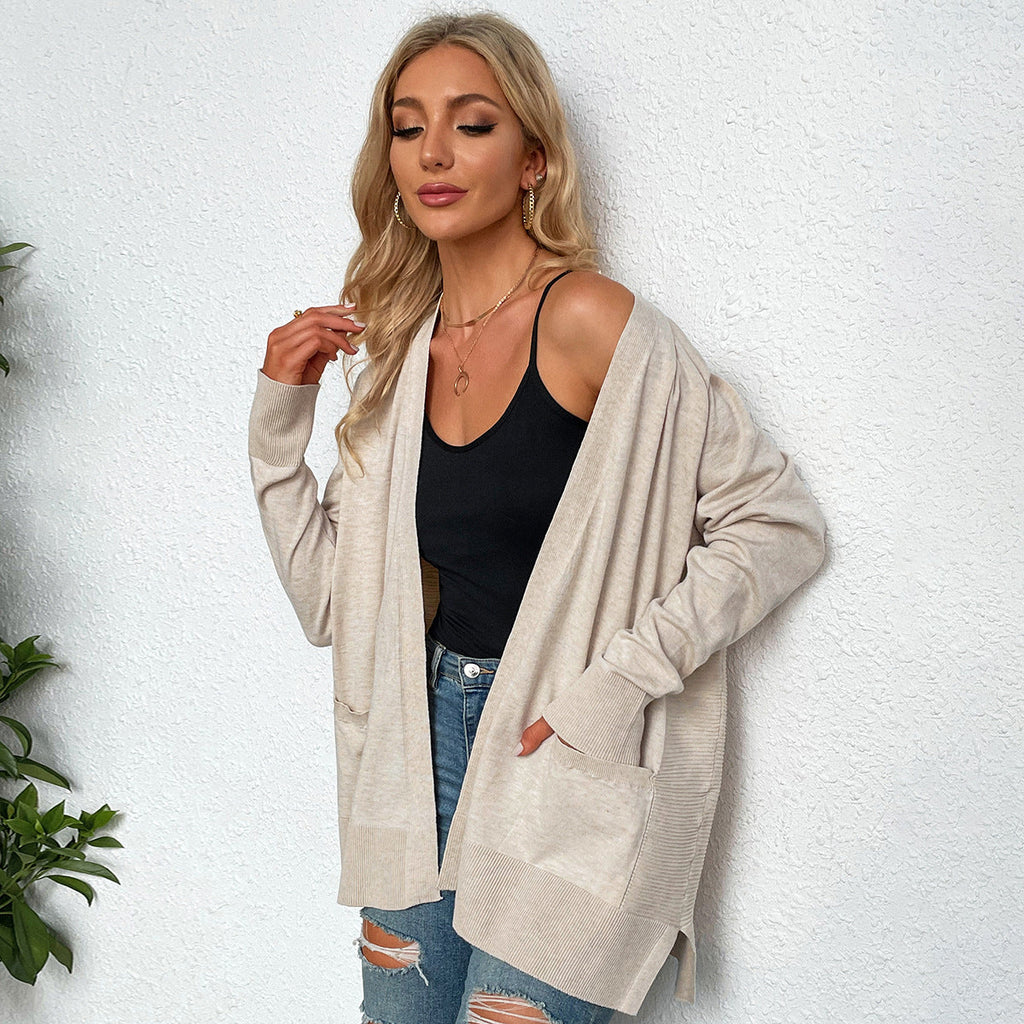 Women's casual knit cardigan with deep V-neck and practical pockets, size S