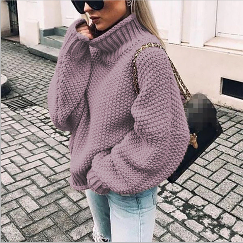 Women's chunky knit sweater with high collar and relaxed fit, size