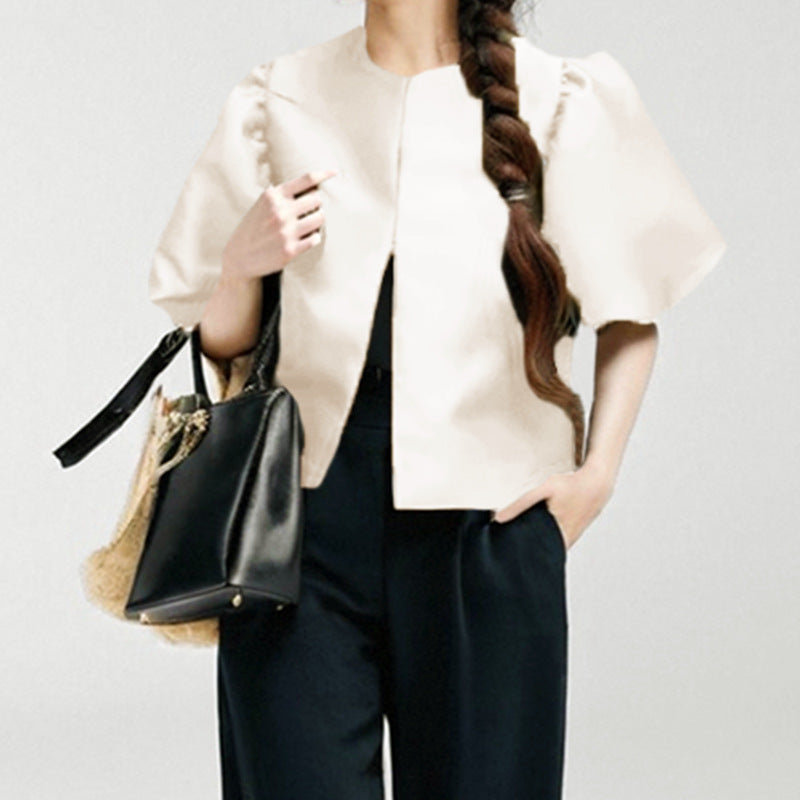 Damenbluse mit voluminösen Puffärmeln und modernem Design, Größe S