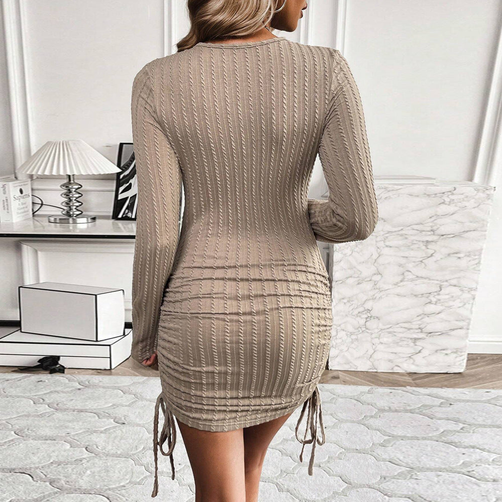 Women's figure-hugging mini dress with button detail and asymmetrical hem, size [size]