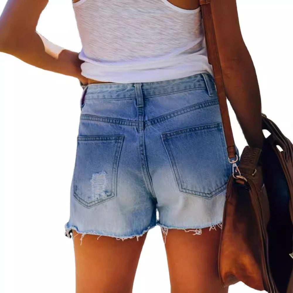 Women's denim shorts with a relaxed fit and eye-catching stars, size S