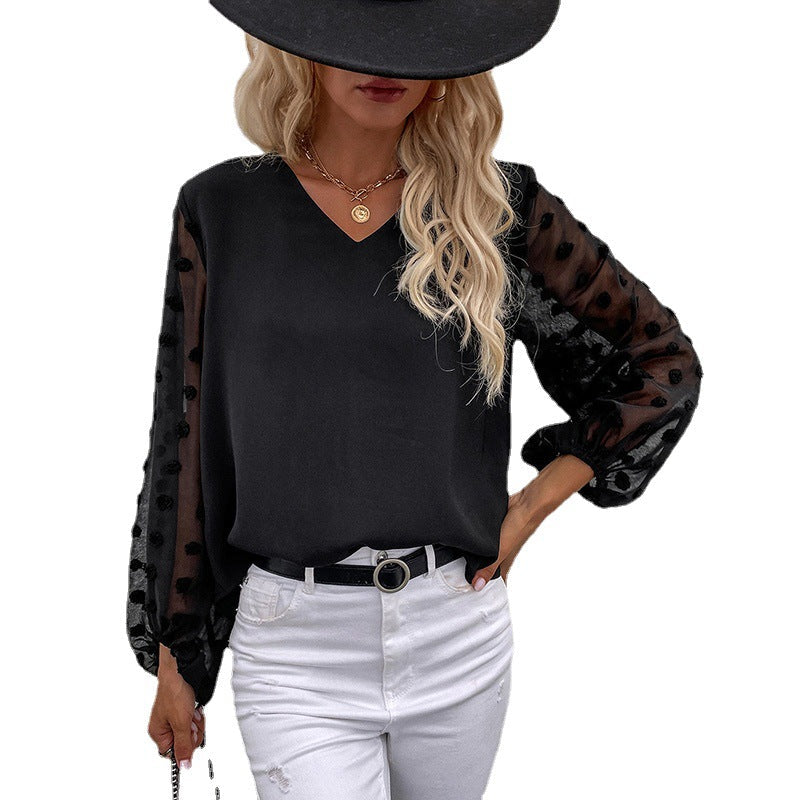 Women's blouse with elegant puff sleeves and textured outer material, size S