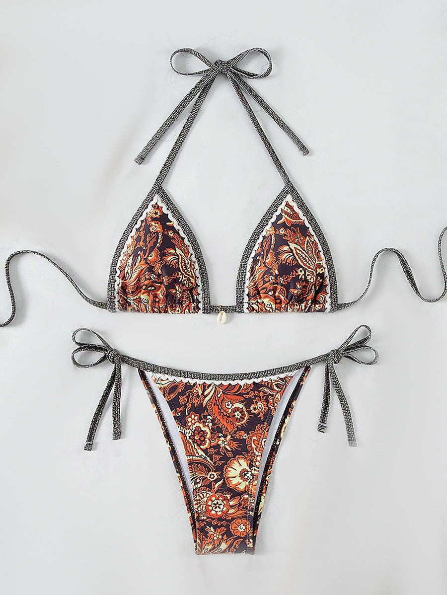 Women's triangle bikini set with playful floral pattern and adjustable ties, size [size]