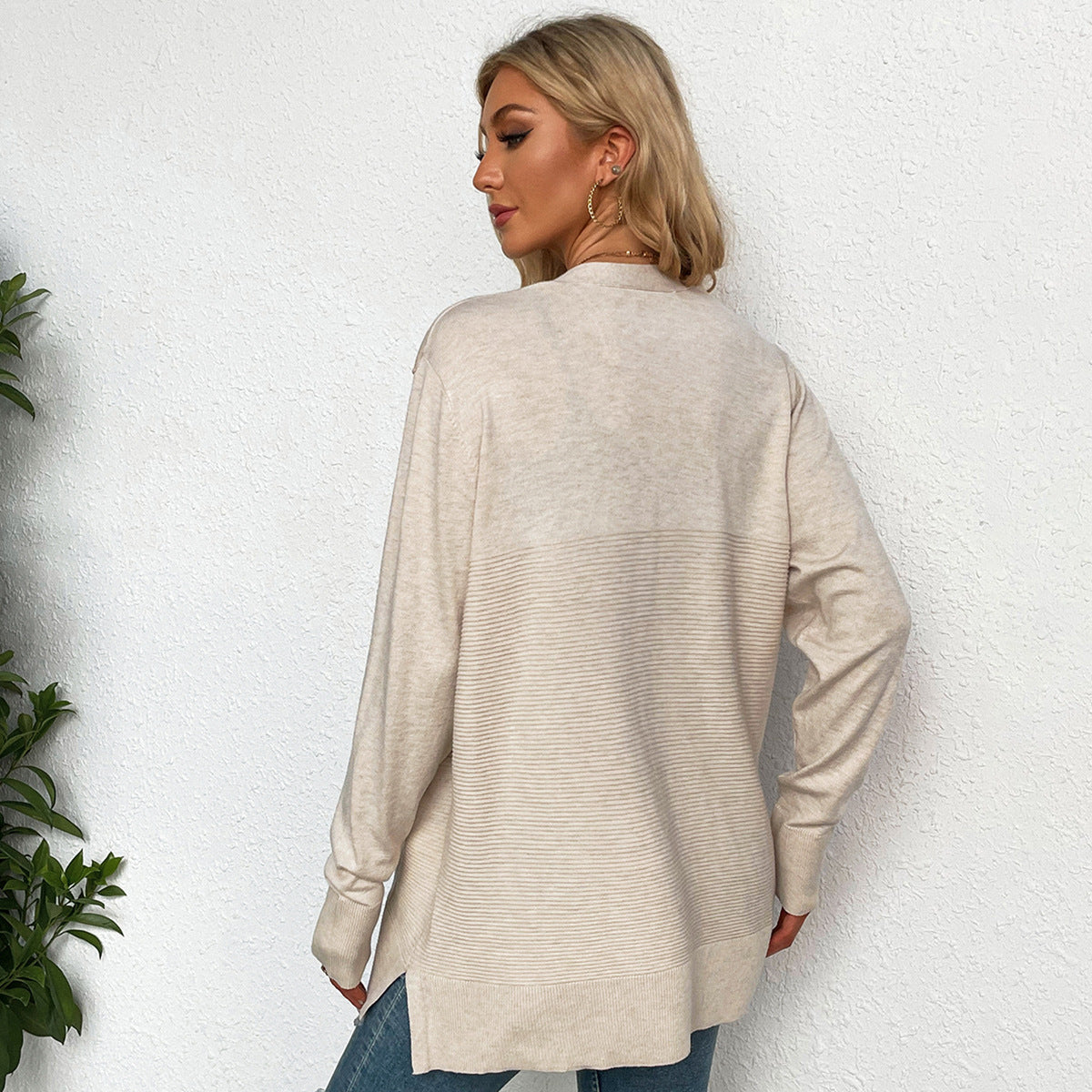 Women's casual knit cardigan with deep V-neck and practical pockets, size S