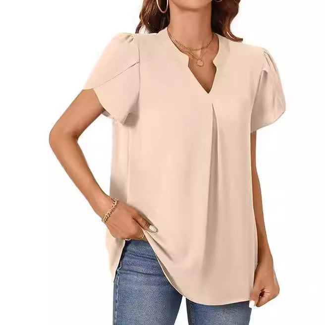 Women's blouse with elegant V-neck detail and light puff sleeves, size [size]