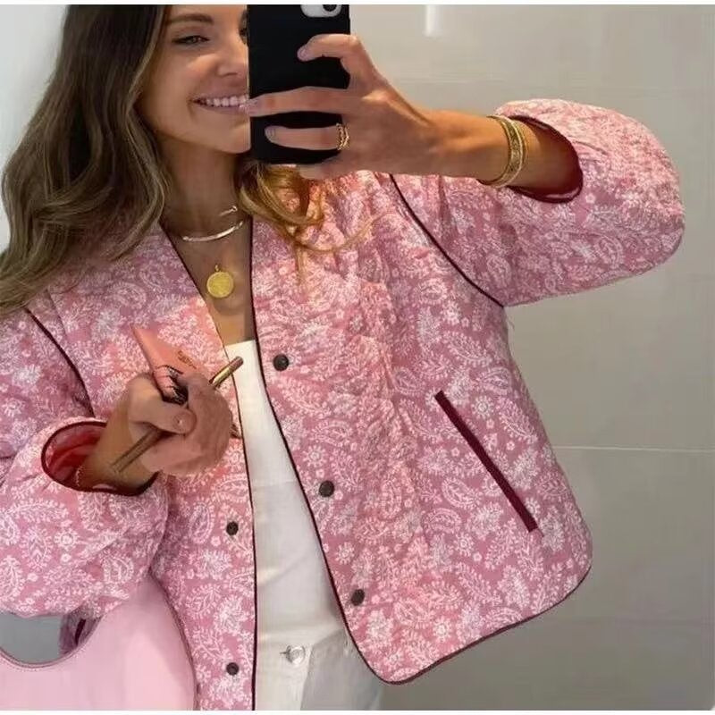Women's quilted jacket with floral design and practical pockets, size S