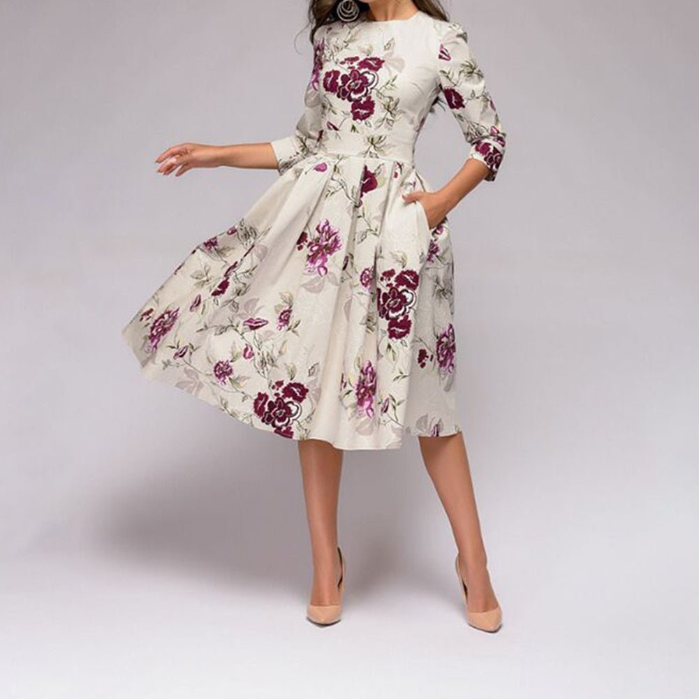 Valenzora | Lässiges Midikleid mit Rundhalsausschnitt, Blumenmuster und Taschen