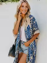 Valenzora | Bohemian kimono with leaf print and fringe detail