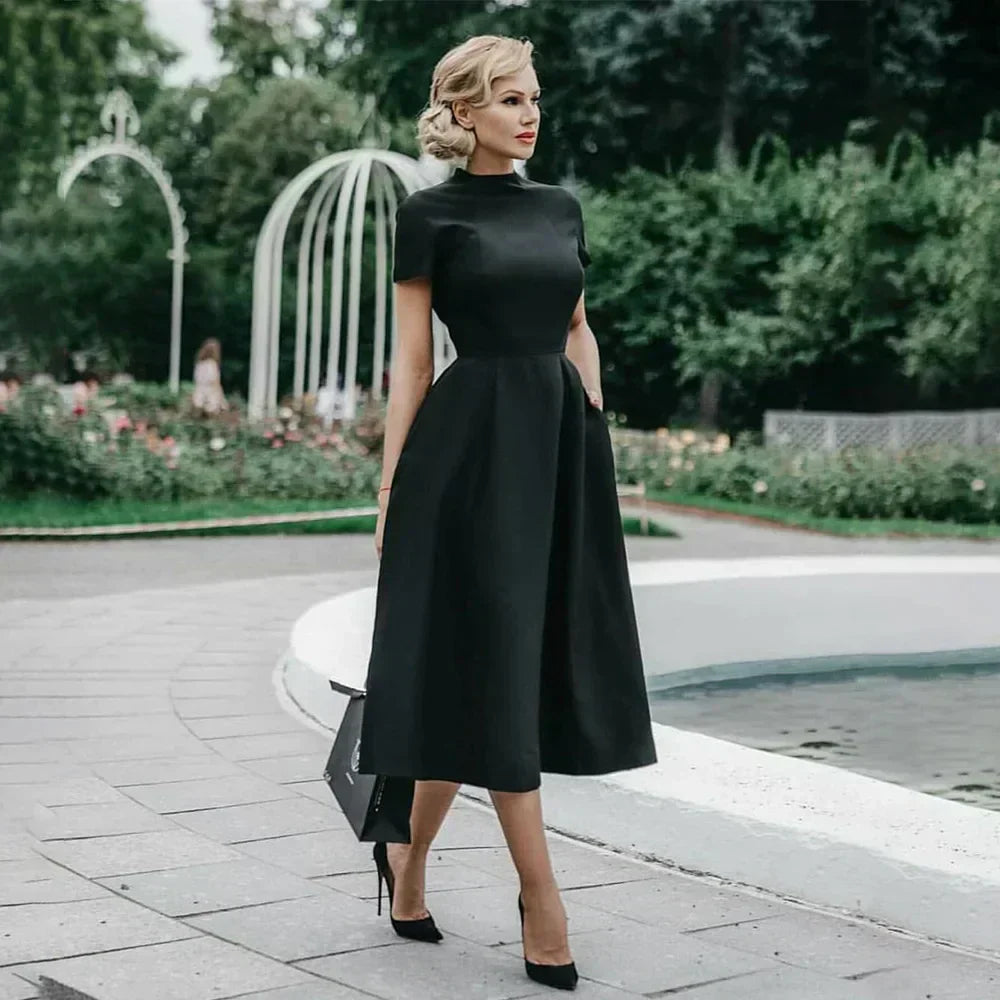 Valenzora | Elegantes schwarzes Damenkleid, halbhoher Kragen, hohe Taille, A-Linien-Kleider, figurbetontes Kleid, Business-Kleid, einfarbige Damen-Vestidos