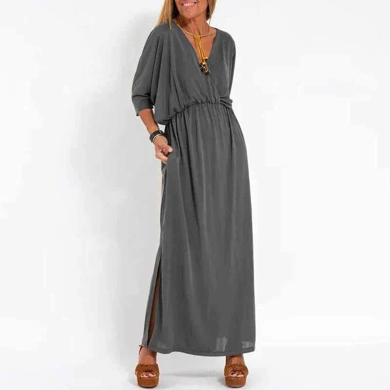 Langes Vintage-Kleid mit seitlichem Schlitz an der Empire-Taille
