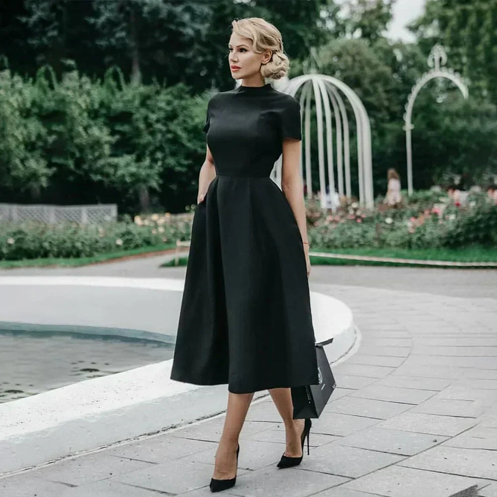 Valenzora | Elegantes schwarzes Damenkleid, halbhoher Kragen, hohe Taille, A-Linien-Kleider, figurbetontes Kleid, Business-Kleid, einfarbige Damen-Vestidos