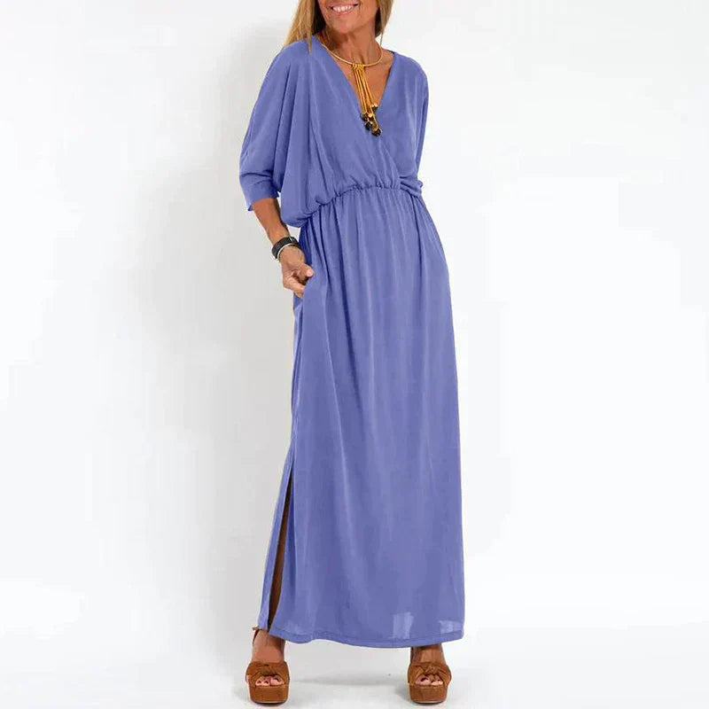 Langes Vintage-Kleid mit seitlichem Schlitz an der Empire-Taille