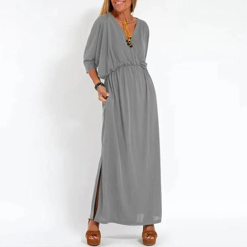 Langes Vintage-Kleid mit seitlichem Schlitz an der Empire-Taille