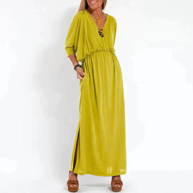 Langes Vintage-Kleid mit seitlichem Schlitz an der Empire-Taille