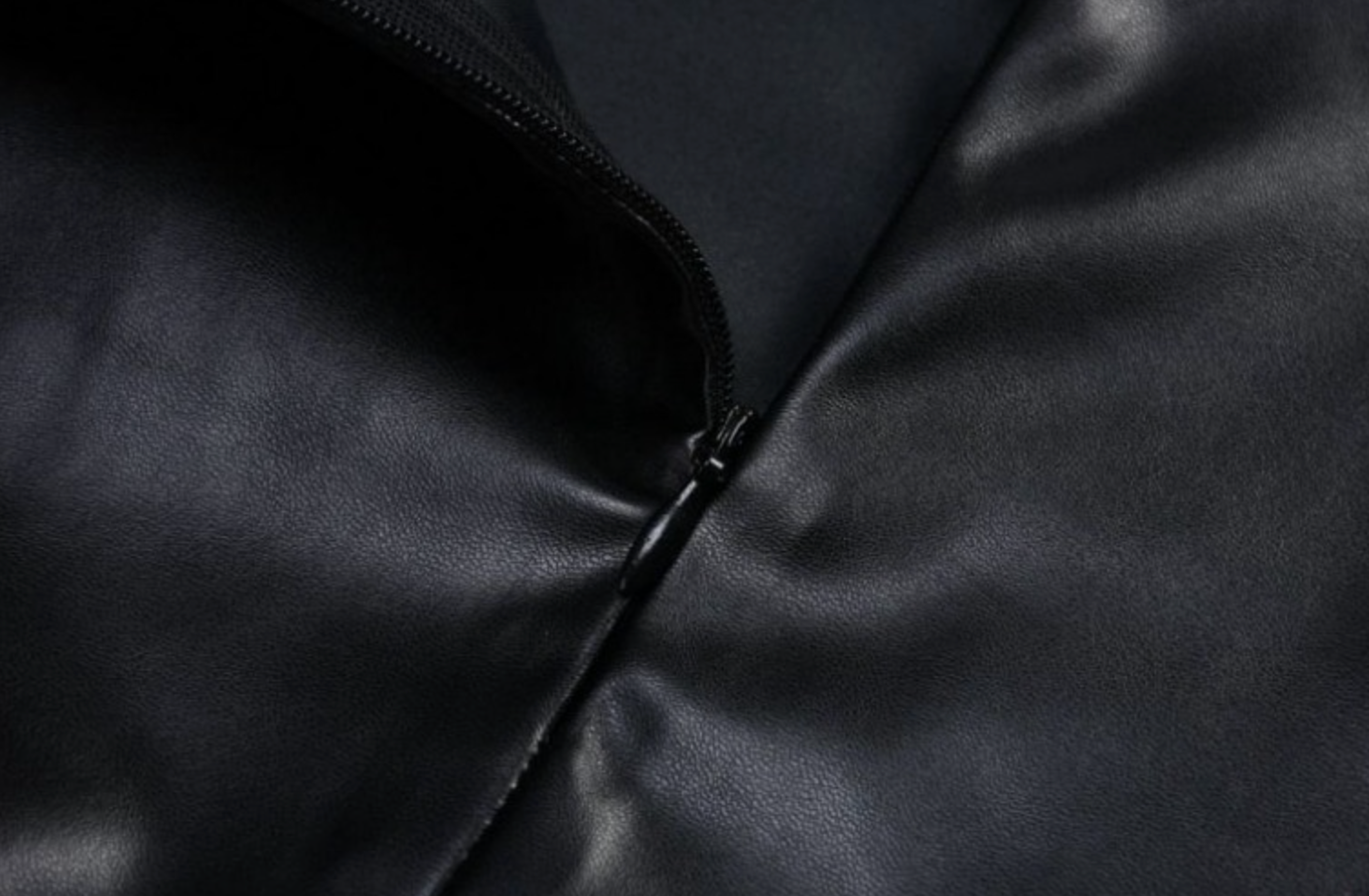 Leather mini skirt with halter neck and open back