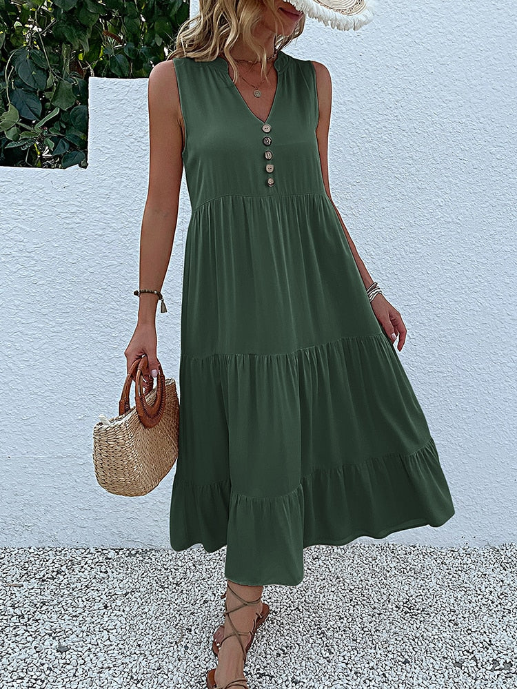 Valenzora | Midi dress Stay comfortable with our loose midi dress, perfect for any occasion