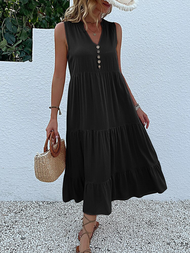 Valenzora | Midi dress Stay comfortable with our loose midi dress, perfect for any occasion