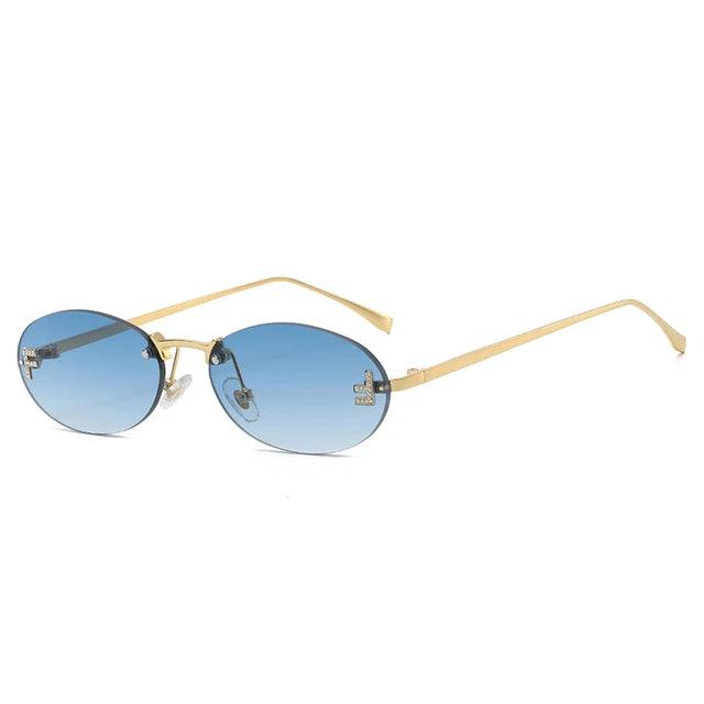 Valenzora | Oval sunglasses with golden accents and subtle stones
